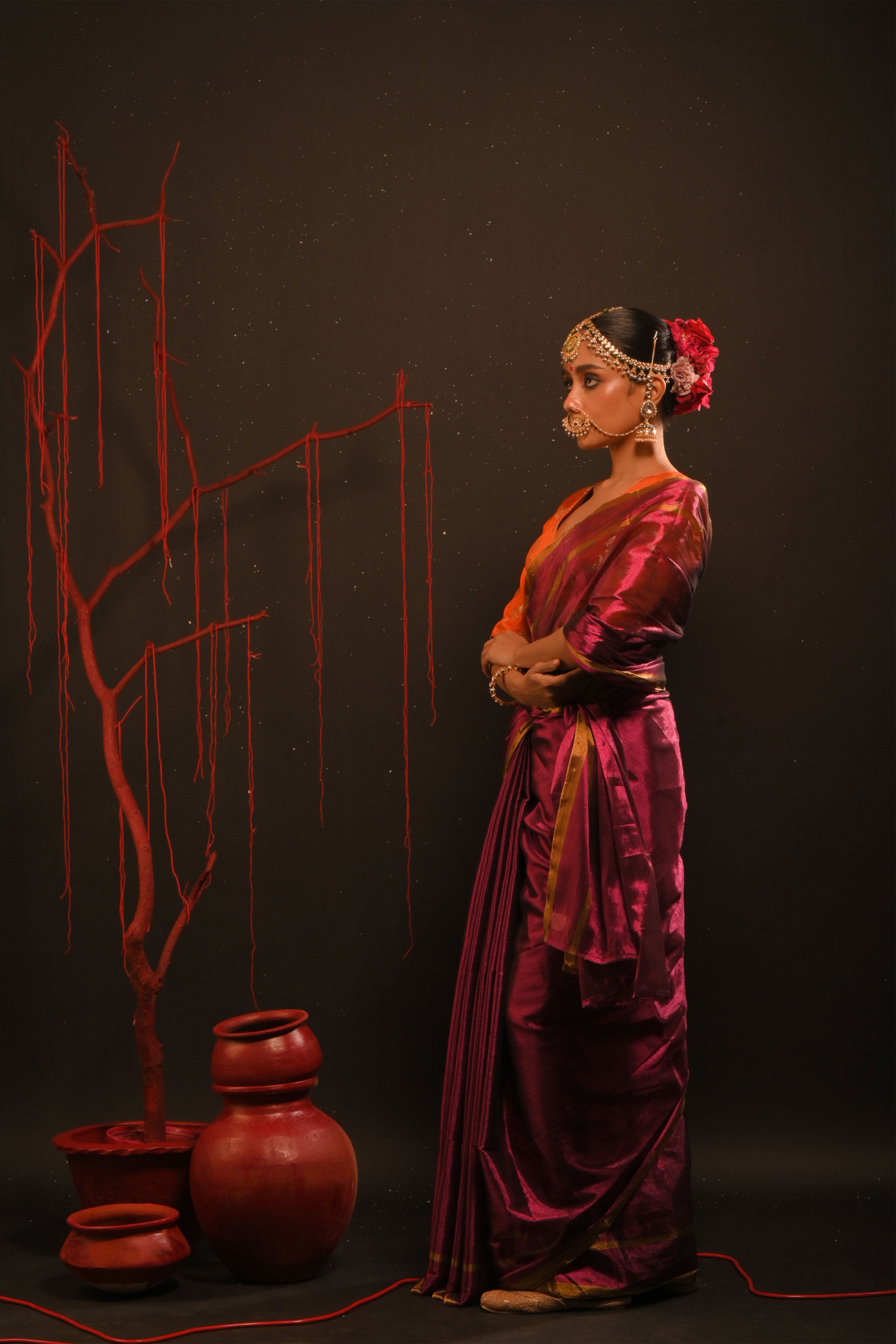 Suchitra I Pink handwoven tissue saree with gold striped border