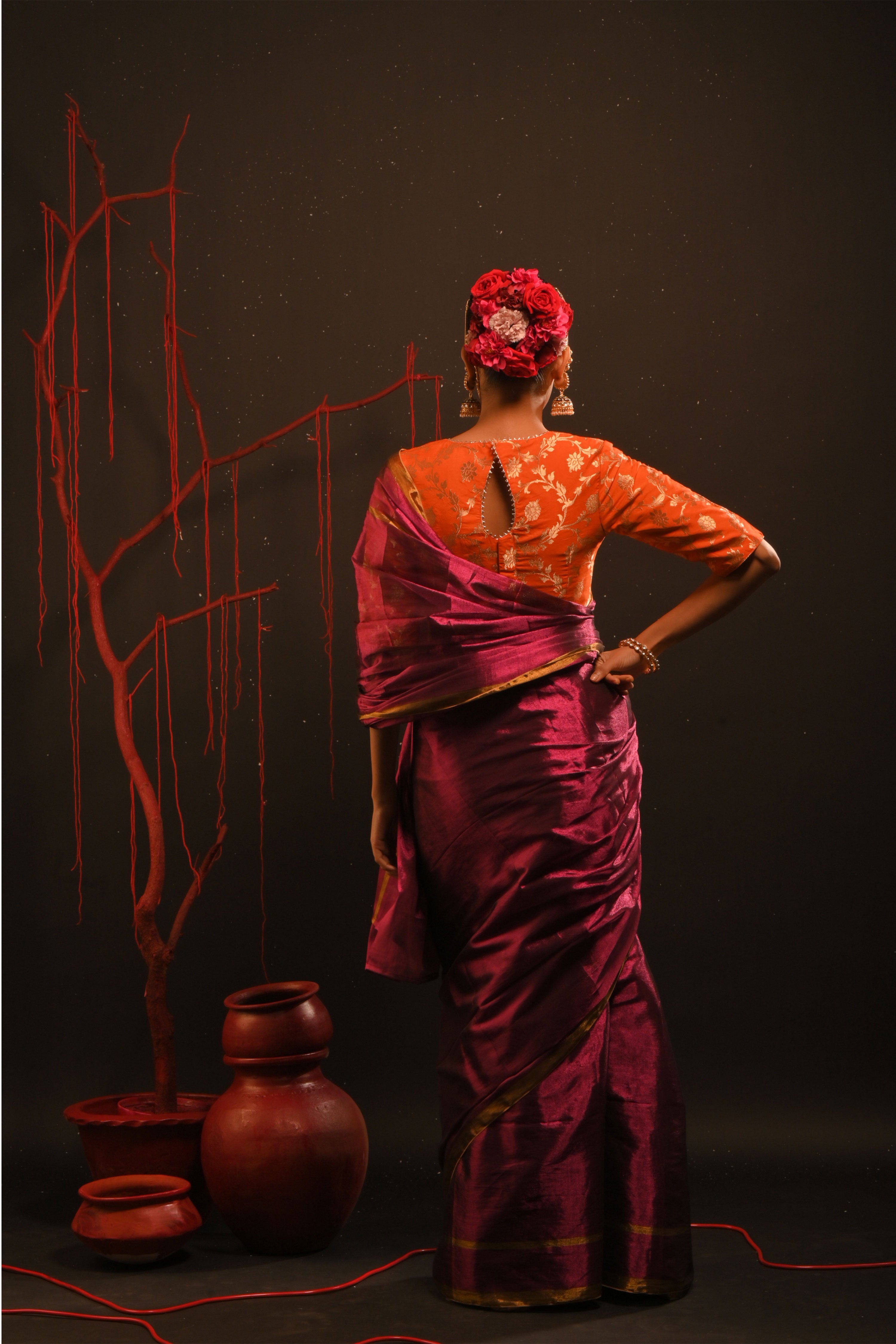 Suchitra I Pink handwoven tissue saree with gold striped border