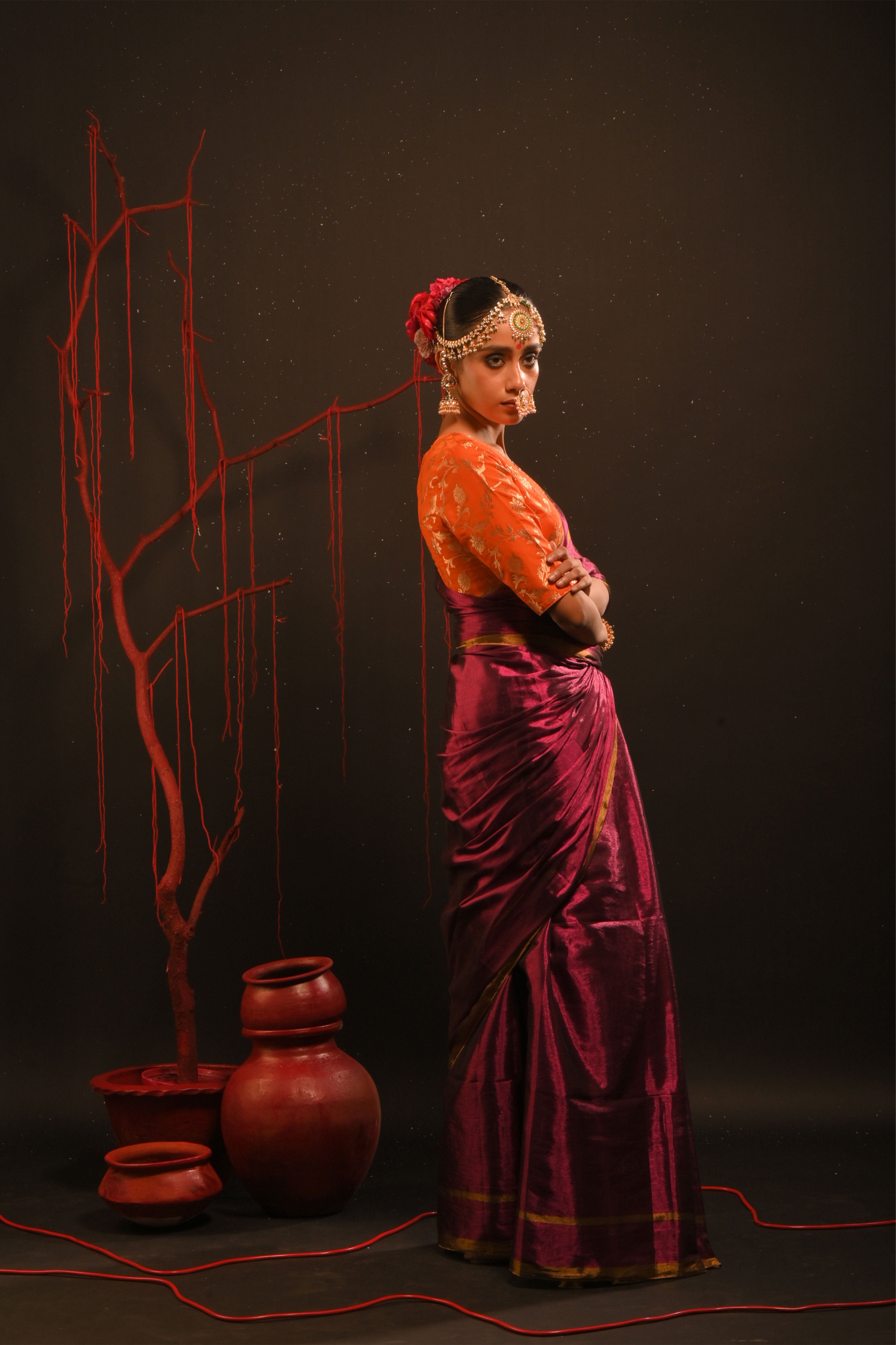 Suchitra I Pink handwoven tissue saree with gold striped border