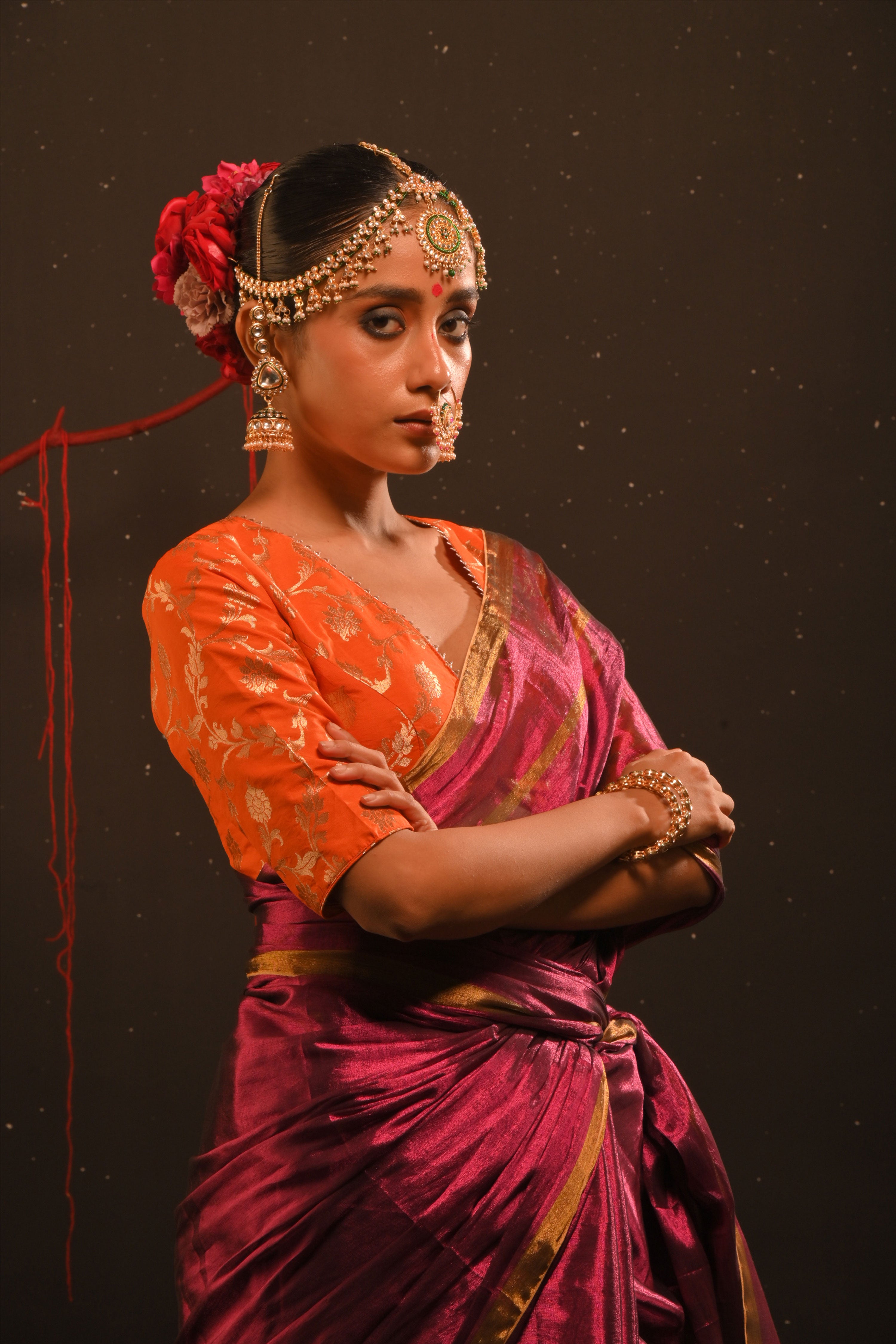 Suchitra I Pink handwoven tissue saree with gold striped border