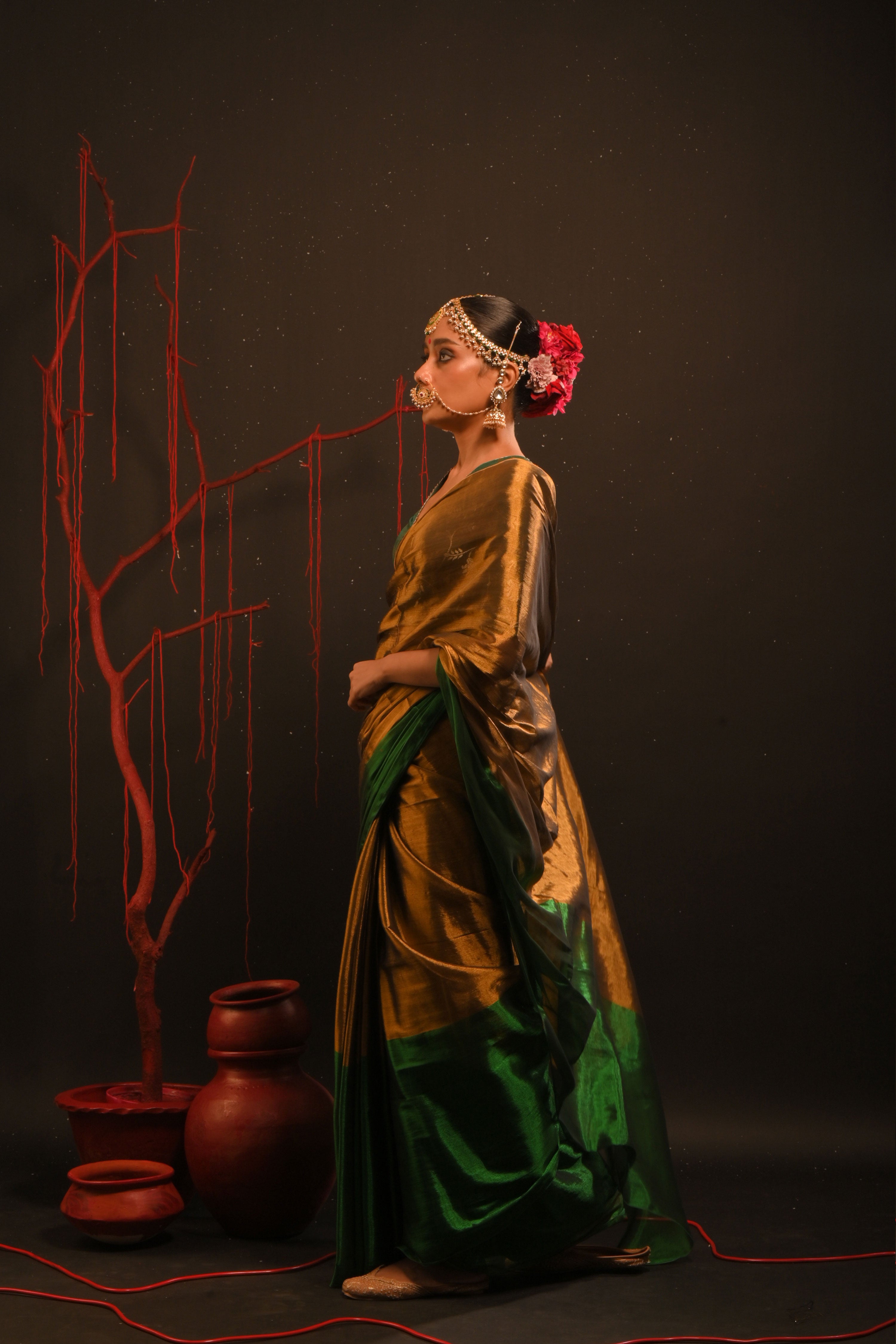 Jaishree I Gold handwoven tissue saree with green border