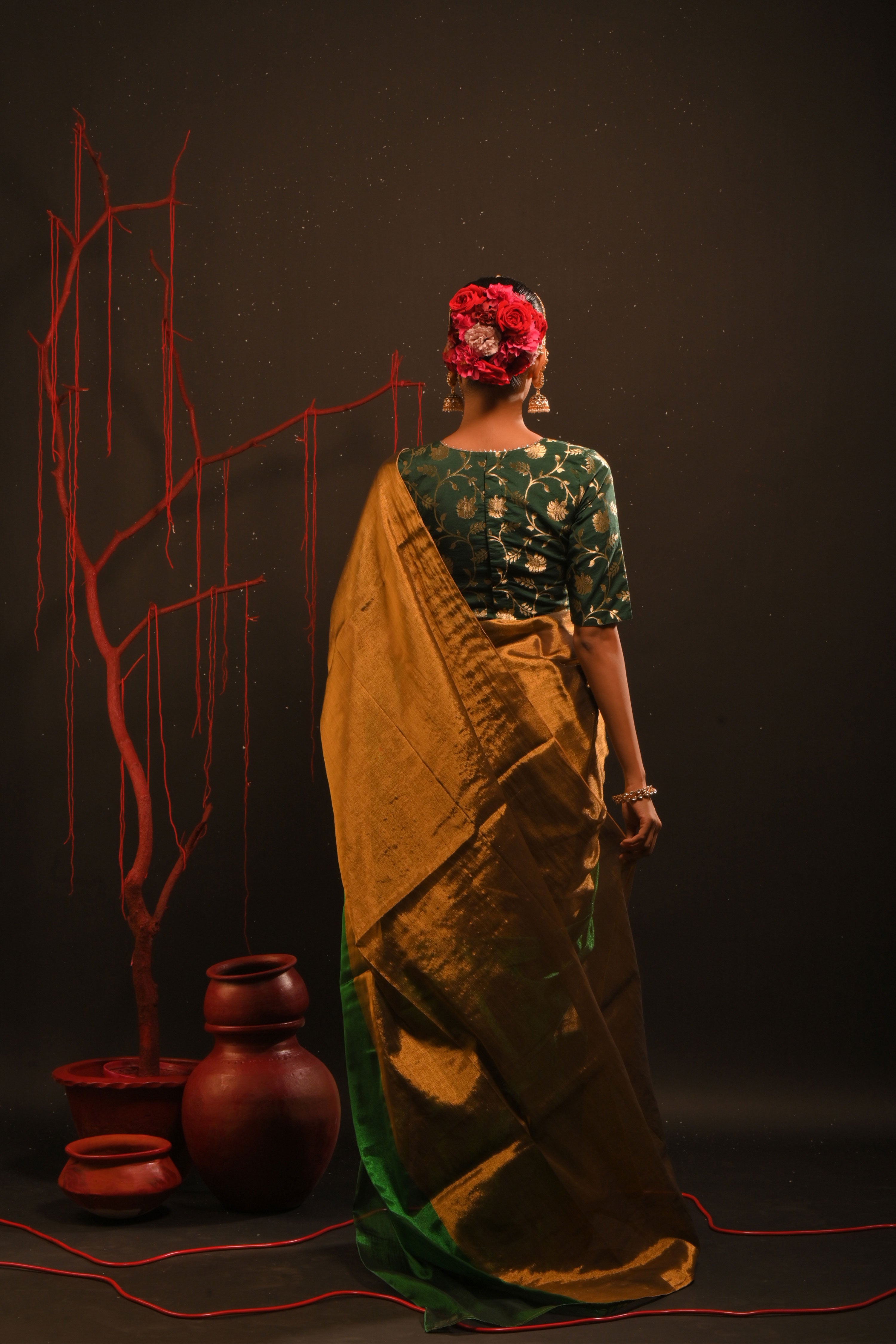 Jaishree I Gold handwoven tissue saree with green border