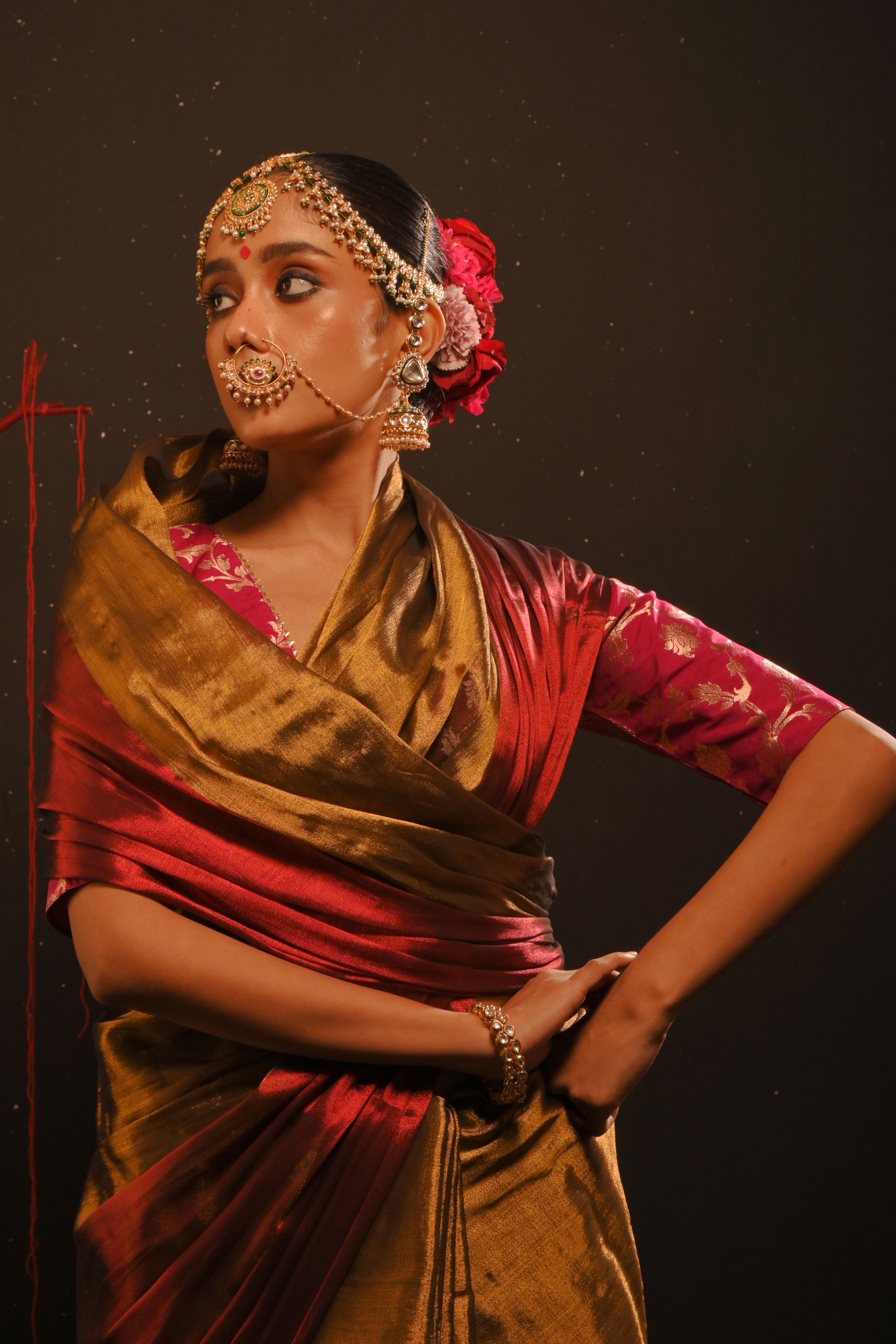 Yagnika I Gold handwoven tissue saree with red border