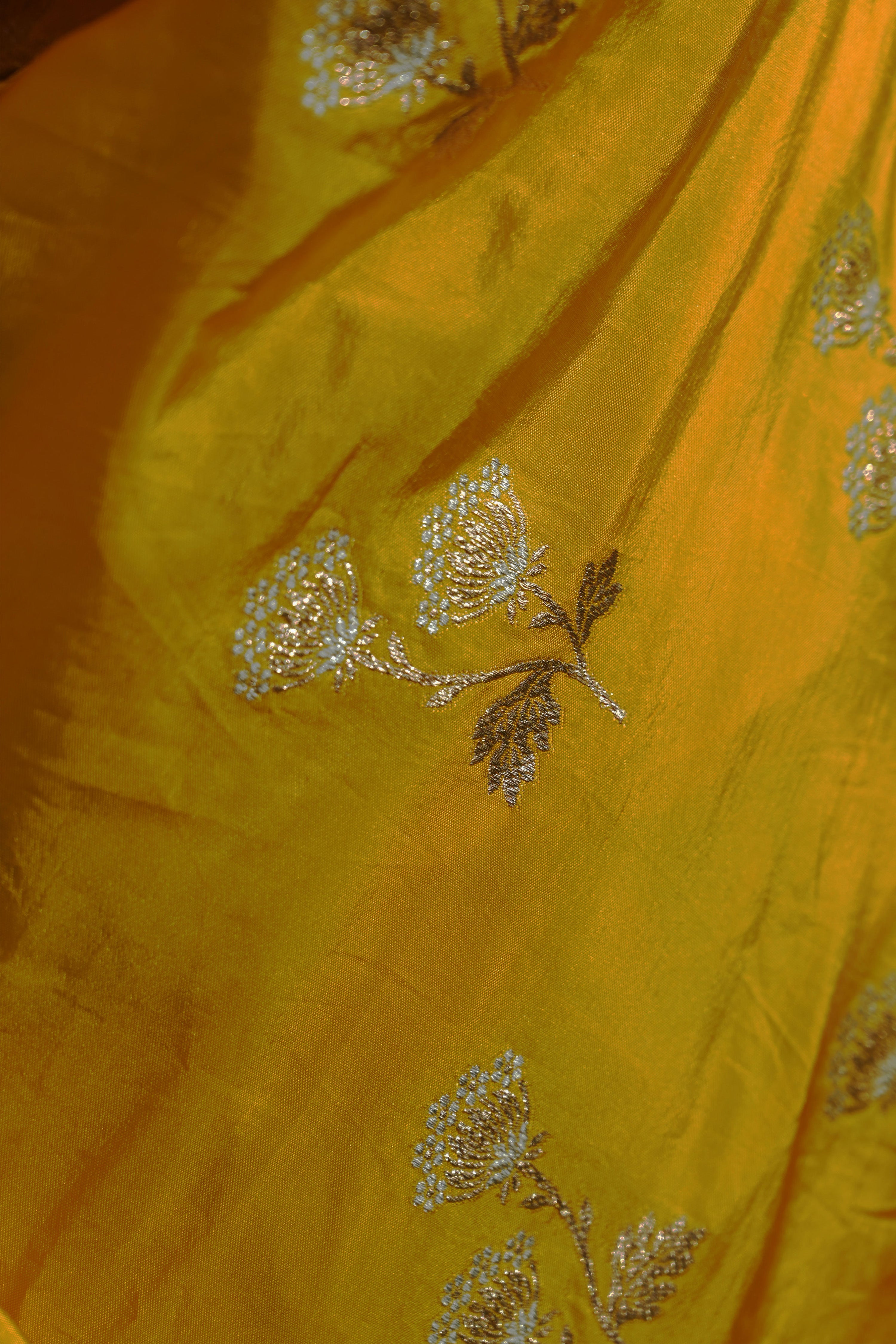Mrignayani I Yellow Handloom Katan Banarasi Saree with Floral Jaal Zari Border and Floral Butis