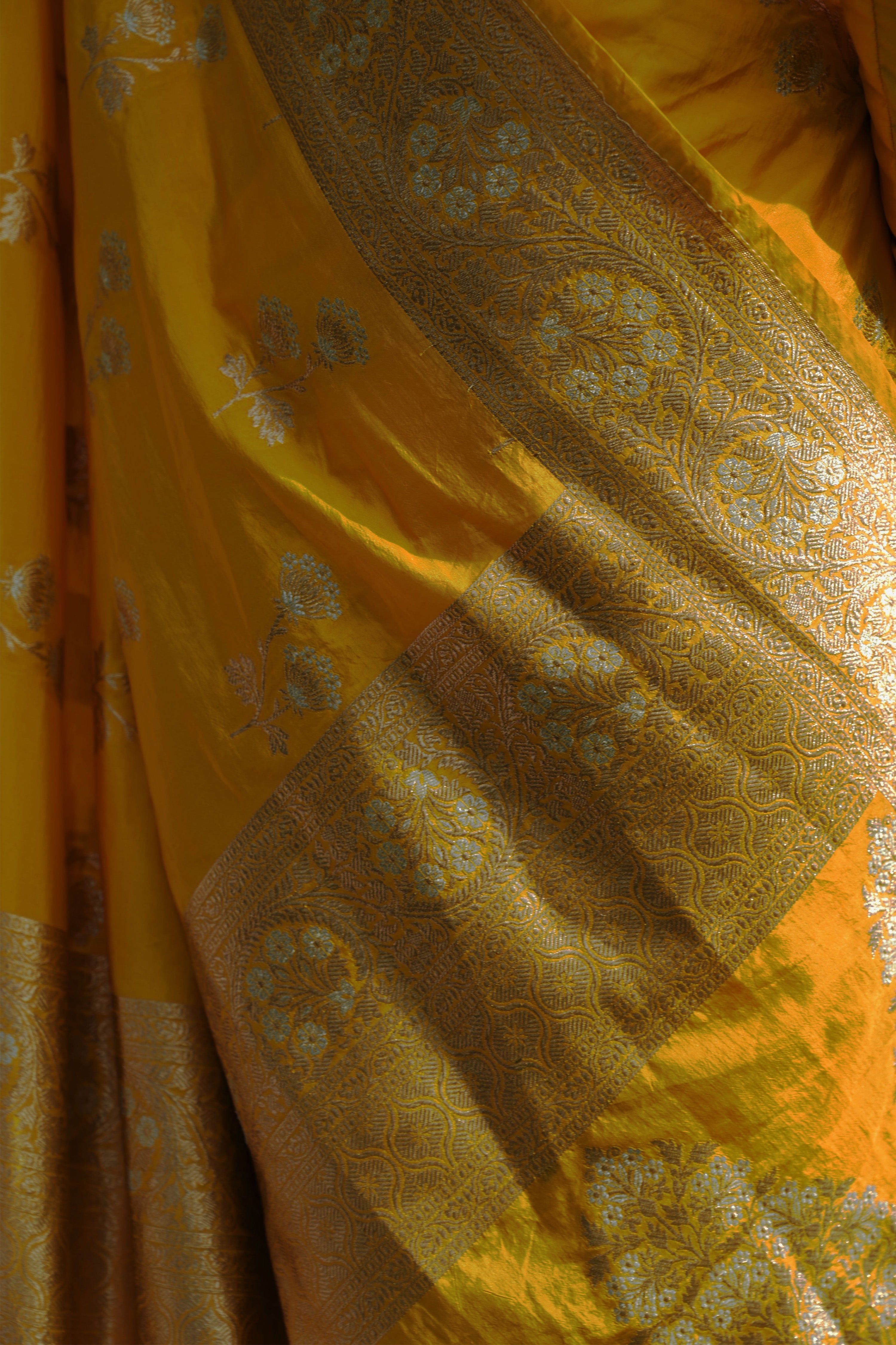 Mrignayani I Yellow Handloom Katan Banarasi Saree with Floral Jaal Zari Border and Floral Butis