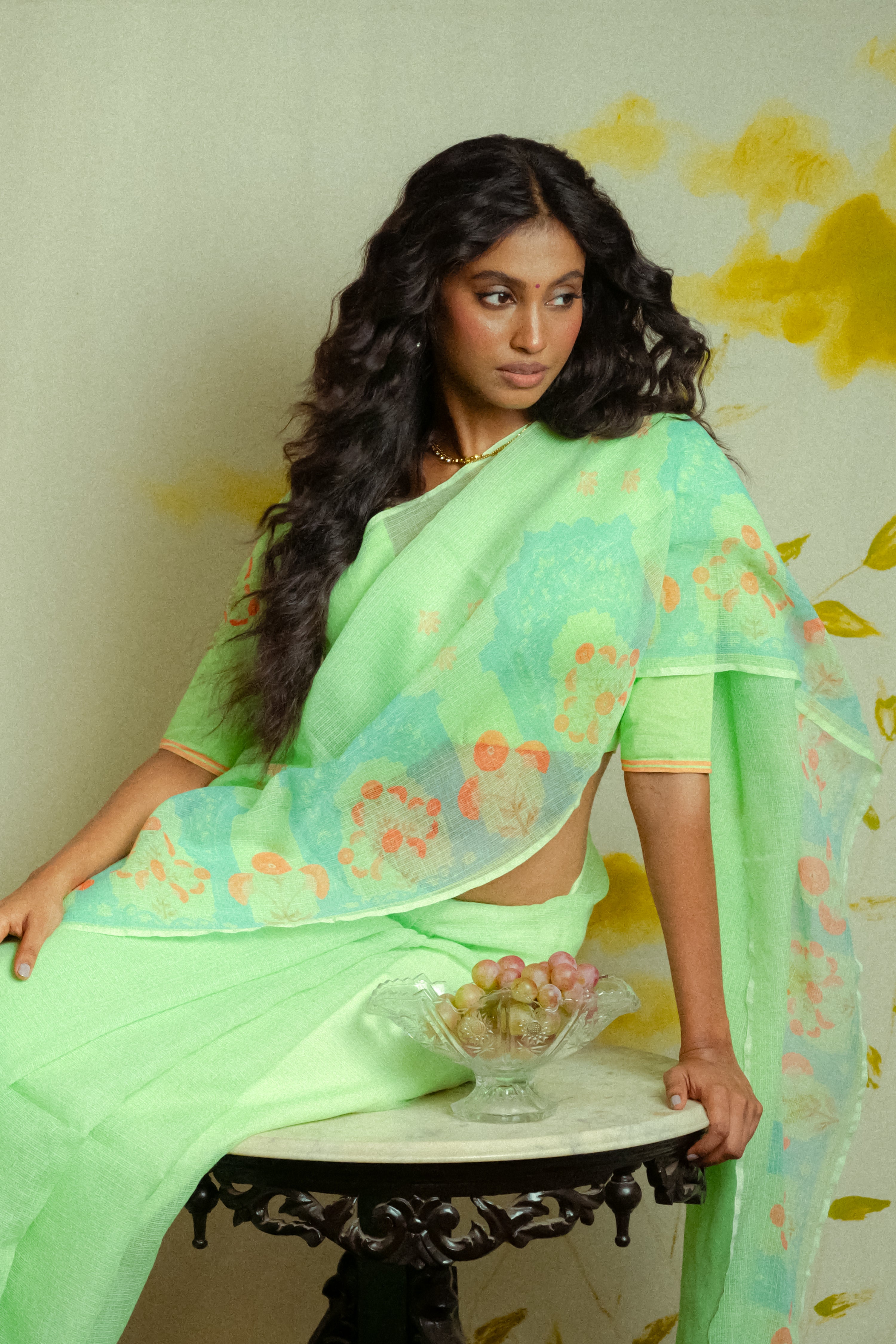 green-coloured-kota-doria-saree-with-blue arches and red florals