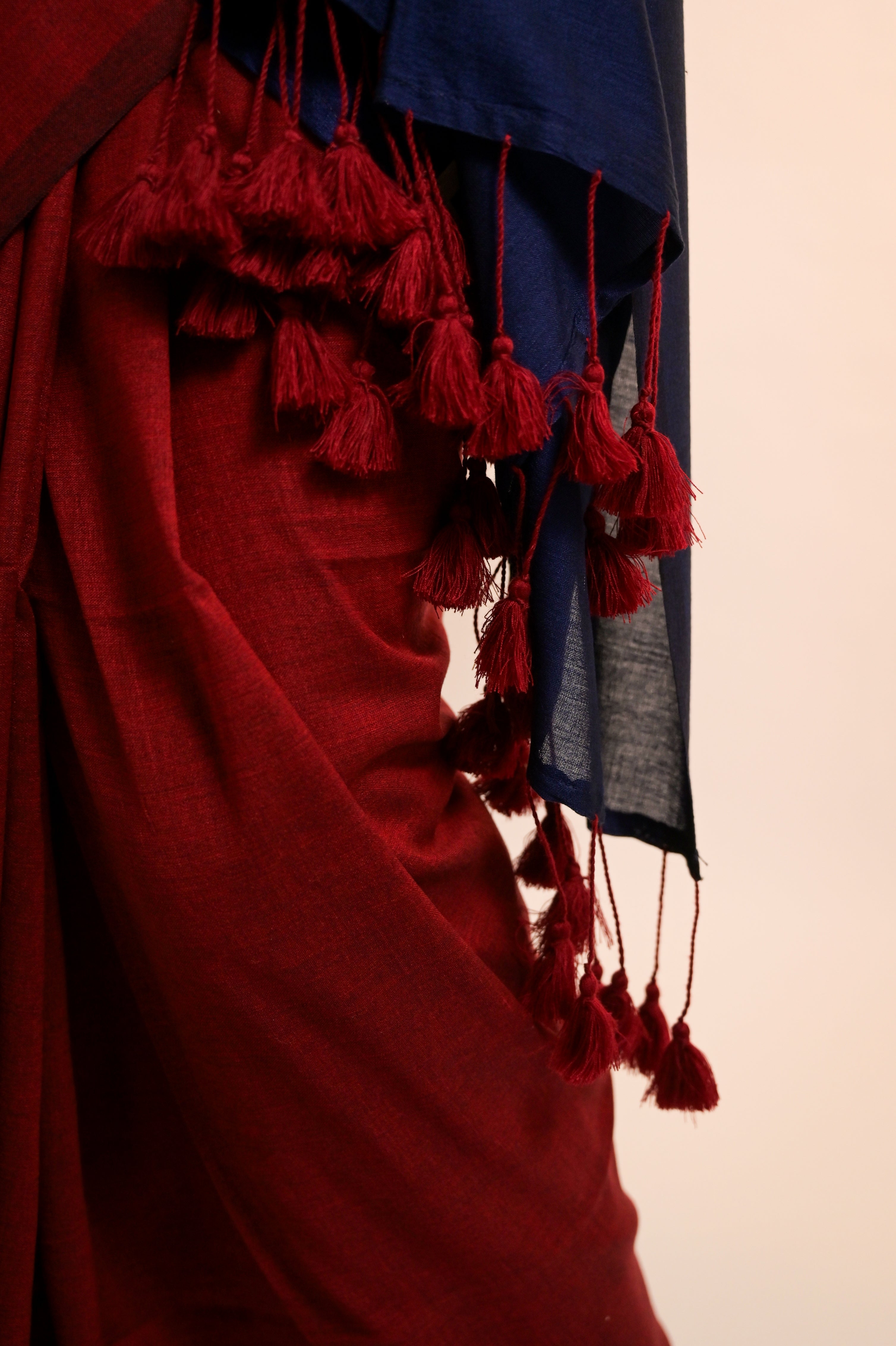 red-cotton-saree-ith-tassels