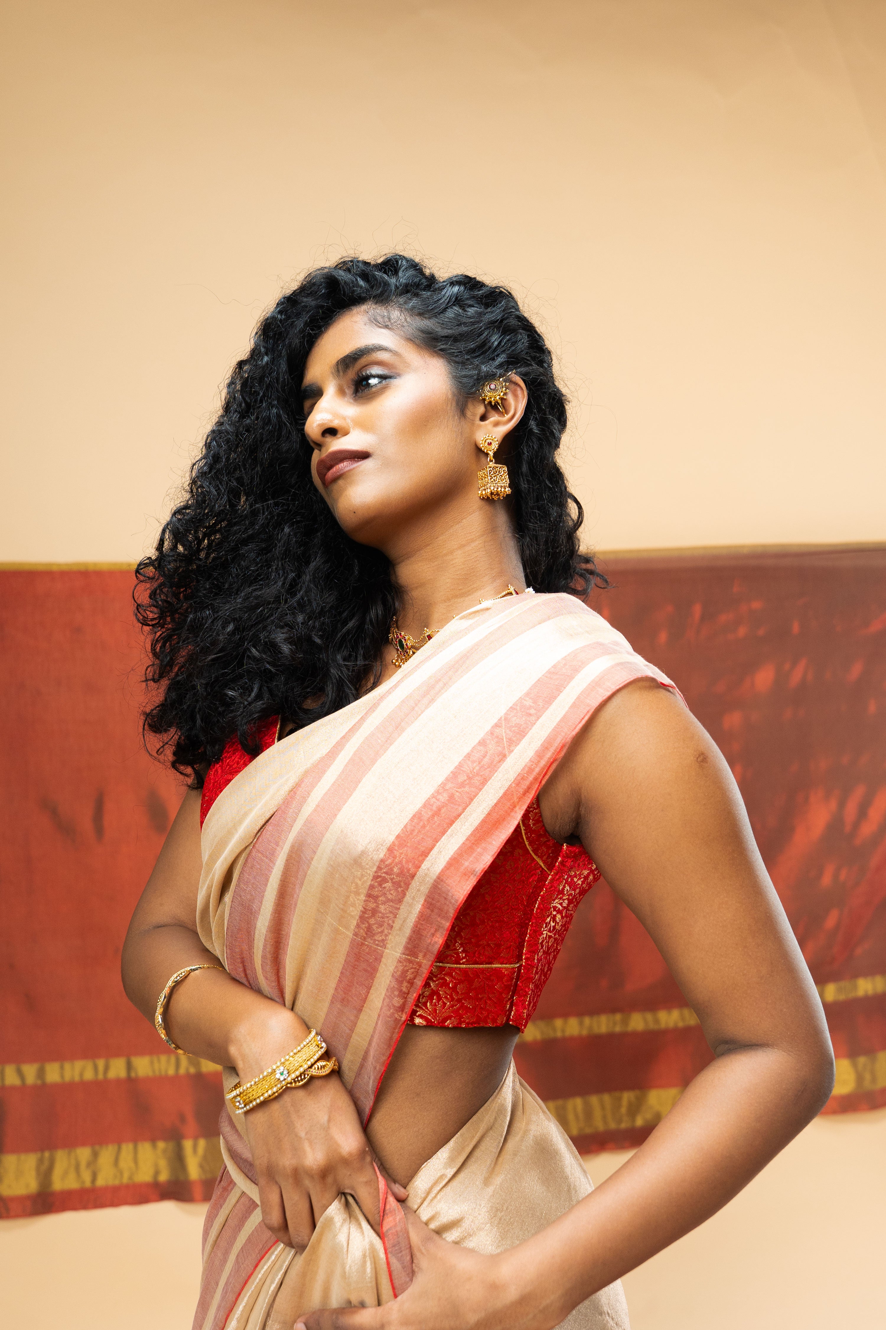 red-striped-rose-gold-coloured-tissue-saree