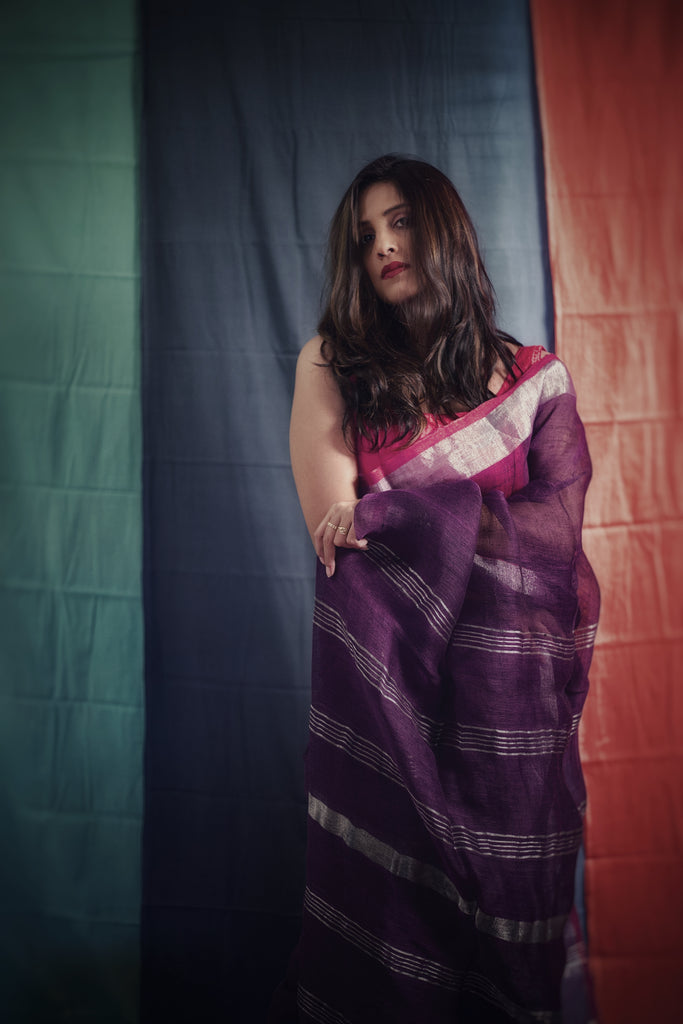 Purple linen saree with zari border